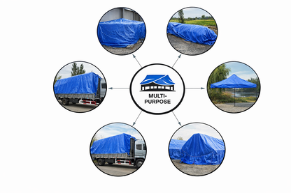 Blue heavy-duty tarp covering large outdoor equipment and materials
